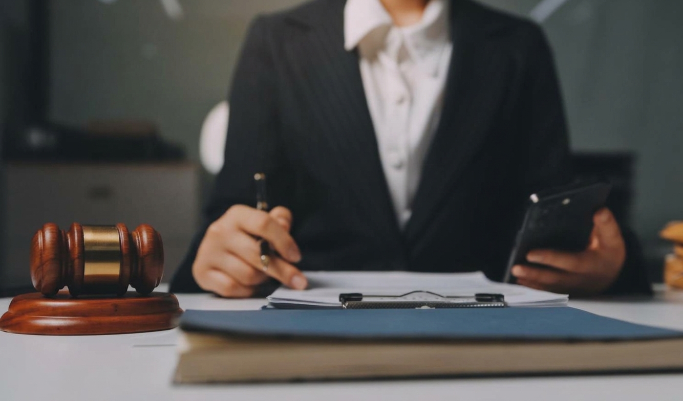 Suzanne E. Rogers reviewing legal documents in her office